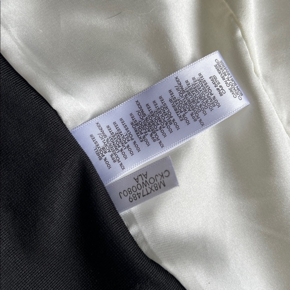 Cream and black quilted fitted vest by Calvin Klein with ribbed knit details sm - Picture 8 of 11